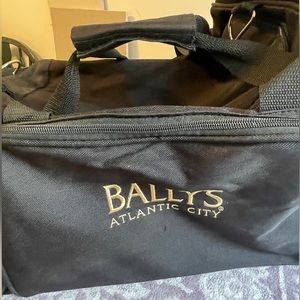 Wheeled travel bag with “Bally’s” logo